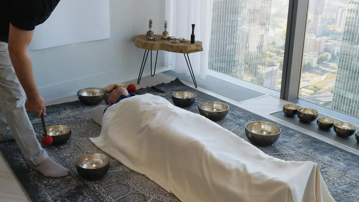 Sound Resonance Therapy session: singing bowls arranged around the body