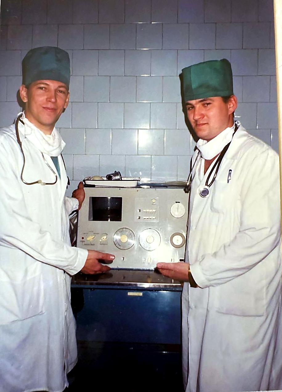 Dr. Surikov with a colleague beside an anaesthesia machine