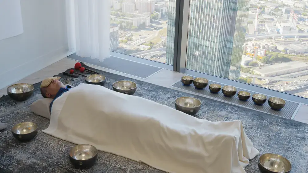Sound Resonance Therapy: bowls arranged around the body on the floor