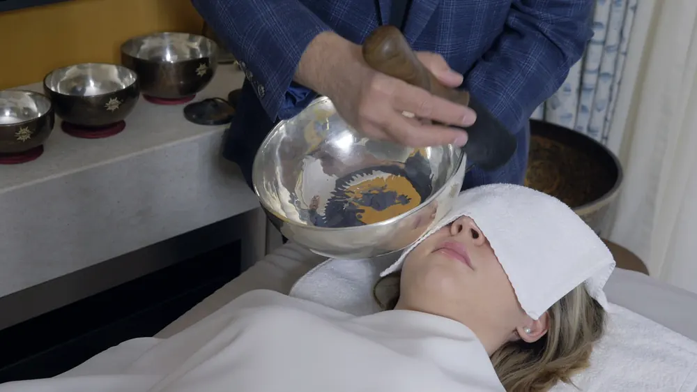 The facial protocol: a bowl worked over the face and neck
